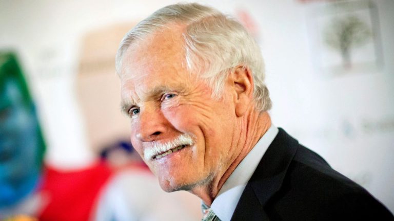 In this Friday, Dec. 6, 2013 photo, Ted Turner is photographed on the red carpet at the Captain Planet Foundation benefit gala in Atlanta. Turner told The Associated Press in a recent interview that when Turner Field is demolished in four years, he hopes the city of Atlanta could turn the vacant area into green space. In November, the Atlanta Braves announced they are moving from Turner Field into a new 42,000-seat stadium complex in Cobb County in 2017. The old stadium, which was named after the 75-year-old media mogul, will be torn down after the Braves leave for their location in the suburbs. Turner, the former owner of the Braves, said he is still trying to fathom the move. (David Goldman/AP)