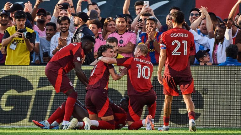 Toronto FC's Djordje Mihailovic (10) celebrates with Theo Corbeanu (7) after a goal against Inter Miami during second half MLS action in Toronto, on Saturday, Sept. 27, 2025. (Sammy Kogan/CP)