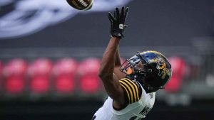 Hamilton Tiger-Cats receiver Tim White makes a reception during the first half of a CFL football game against the BC Lions, in Vancouver, on Sunday, July 27, 2025. White signed with the Winnipeg Blue Bombers. (Darryl Dyck/THE CANADIAN PRESS)
