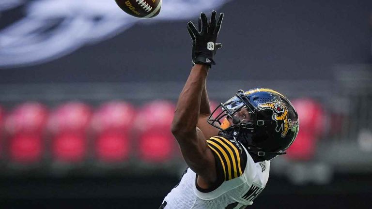 Hamilton Tiger-Cats receiver Tim White makes a reception during the first half of a CFL football game against the BC Lions, in Vancouver, on Sunday, July 27, 2025. White signed with the Winnipeg Blue Bombers. (Darryl Dyck/THE CANADIAN PRESS)