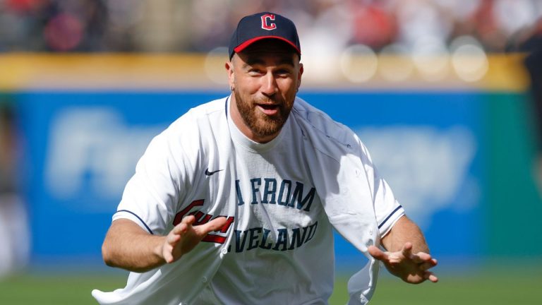 Kansas City Chiefs tight end Travis Kelce reacts after throwing out the ceremonial first pitch before a baseball game between the Cleveland Guardians and the Seattle Mariners, Friday, April 7, 2023, in Cleveland. (Ron Schwane/AP)