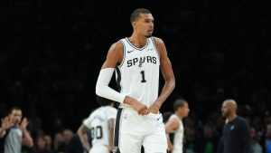 San Antonio Spurs forward Victor Wembanyama (1) walks across the court after committing a flagrant foul that forced his ejection during the first half of Game 4 of an NBA basketball second-round playoff series against the Minnesota Timberwolves in Minneapolis, Sunday, May 10, 2026. (Abbie Parr/AP)