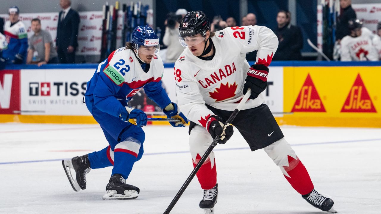 Canada surges past Slovakia late at hockey worlds