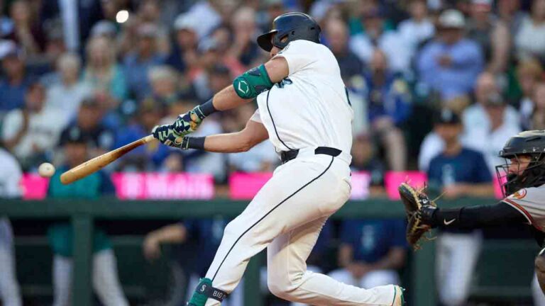 Seattle Mariners' Cal Raleigh hits a two-run single during the seventh inning in a baseball game against the Baltimore Orioles, Tuesday, June 16, 2026, in Seattle. (John Froschauer/AP)