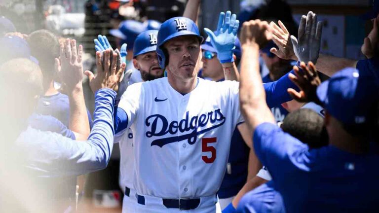 Los Angeles Dodgers' Freddie Freeman celebrates his two-run home run in the dugout during the sixth inning of a baseball game against the Tampa Bay Rays in Los Angeles, Wednesday, June 17, 2026. (Kyusung Gong/AP)