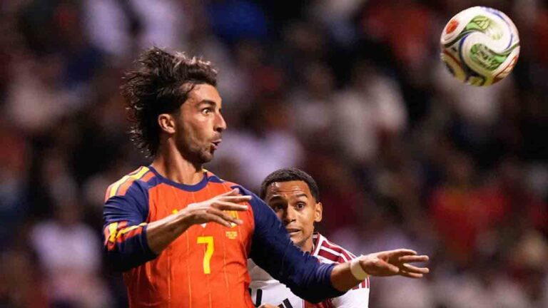 Spain's Ferran Torres, left, and Peru's Marcos Lopez vie for the ball during an international soccer match in Puebla, Mexico, Monday, June 8, 2026. (Fernando Llano/AP)