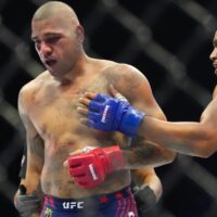 Alex-Pereira,-left,-fights-Ciryl-Gane-during-their-interim-heavyweight-title-bout-at-UFC-Freedom-250-on-the-South-Lawn-of-the-White-House-in-Washington