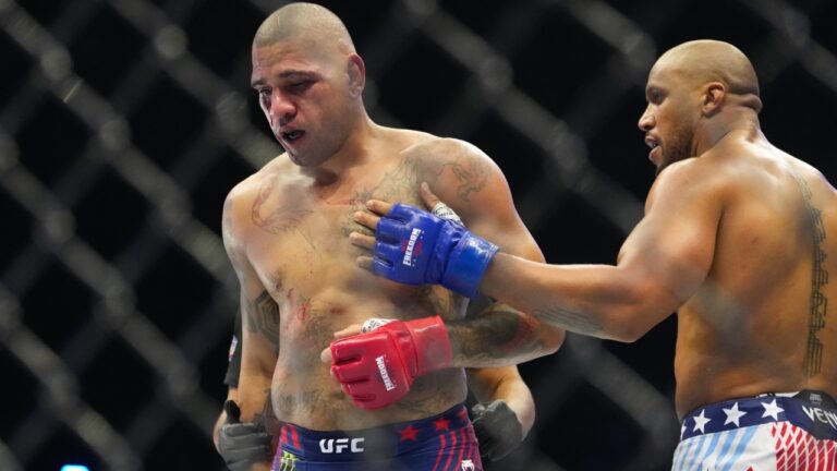 Alex Pereira, left, fights Ciryl Gane during their interim heavyweight title bout at UFC Freedom 250 on the South Lawn of the White House in Washington. (AP Photo/Alex Brandon)