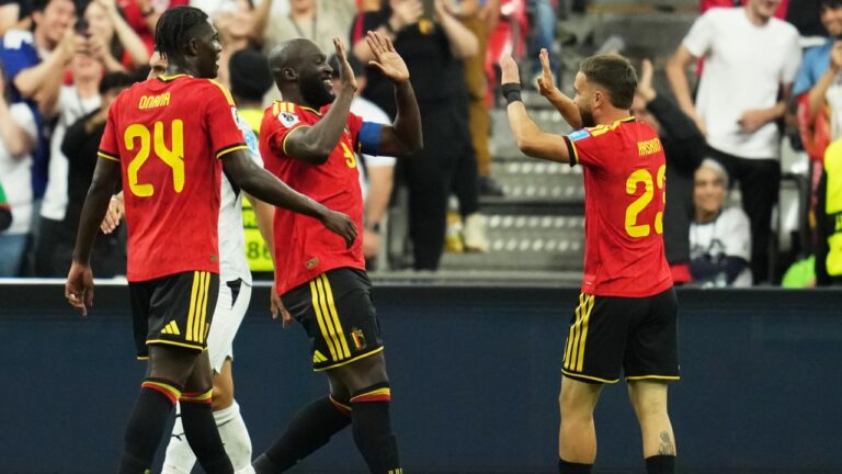 Belgium's Romelu Lukaku, second left, celebrates with teammate Belgium's Nicolas Raskin (23)after scoring his team's fourth goal during the World Cup Group G soccer match between New Zealand and Belgium in Vancouver, British Columbia, Friday, June 26, 2026. (AP Photo/Abbie Parr)