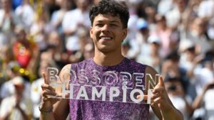 United States' Ben Shelton poses for a photo after winning the Stuttgart Open tennis final match against United States' Taylor Fritz in Stuttgart, Germany, Sunday, June 14, 2026. (Marijan Murat/dpa via AP)