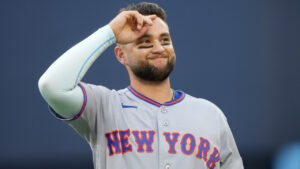 New York Mets third baseman Bo Bichette (19) acknowledges the crowd as he's presented with a tribute video from his time as a Toronto Blue Jay prior to first inning American League MLB baseball action between the Toronto Blue Jays and the New York Mets, in Toronto, Monday, June 29, 2026. (Nathan Denette/CP)