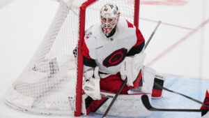 Carolina Hurricanes goaltender Brandon Bussi protects the net during the third period of an NHL game against the New York Islanders Tuesday, April 14, 2026, in Elmont, N.Y. (Frank Franklin II/AP)