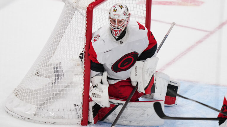 Carolina Hurricanes goaltender Brandon Bussi (32) protects the net during the third period of an NHL hockey game against the New York Islanders Tuesday, April 14, 2026, in Elmont, N.Y. (Frank Franklin II/AP)