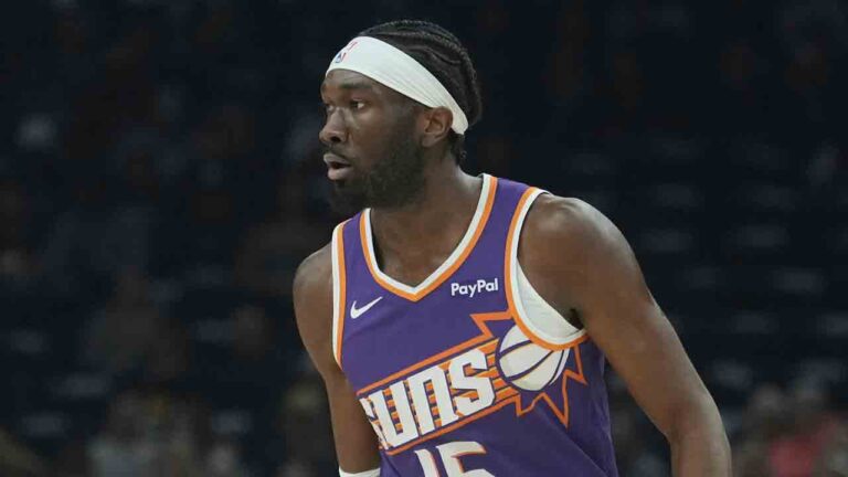 Phoenix Suns center Mark Williams pauses with the basketball against the Cleveland Cavaliers during the first half of an NBA basketball game Friday, Jan. 30, 2026, in Phoenix. (Ross D. Franklin/AP)