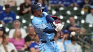 Toronto Blue Jays' Ernie Clement hits an RBI single during the ninth inning of a baseball game against the Milwaukee Brewers, Tuesday, April 14, 2026, in Milwaukee. (Aaron Gash/AP)