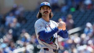 Toronto Blue Jays starting pitcher Dylan Cease (84) reacts after giving up a solo home run to Minnesota Twins' Byron Buxton during the first inning of a baseball game, Saturday, May 2, 2026, in Minneapolis. (Matt Krohn/AP)