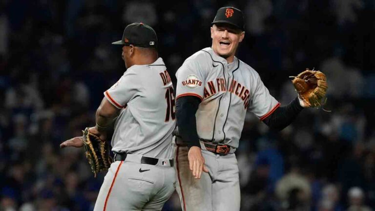 San Francisco Giants first baseman Rafael Devers, left, celebrates with third baseman Matt Chapman after the Giants defeated the Chicago Cubs in a baseball game in Chicago, Sunday, June 7, 2026. (Nam Y. Huh/AP)