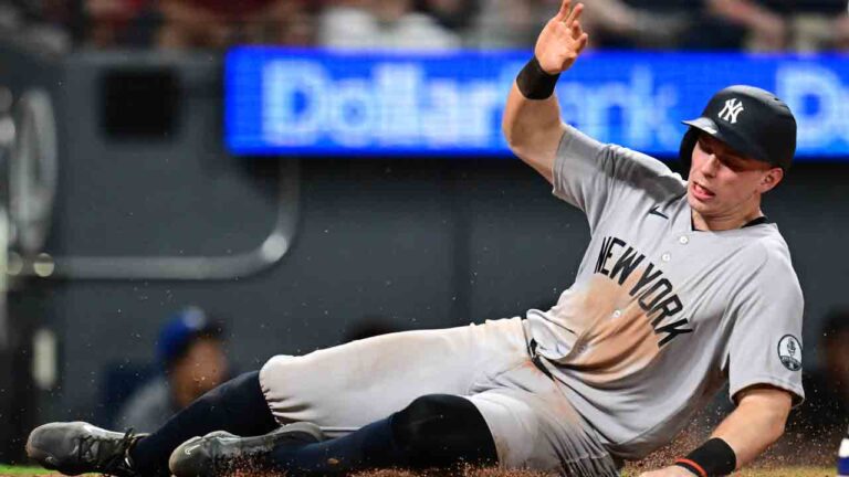 New York Yankees' Ben Rice scores a run on a two-RBI single by Cody Bellinger during the tenth inning of a baseball game against the Cleveland Guardians, Monday, June 8, 2026, in Cleveland. (David Dermer/AP)