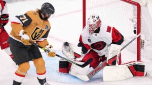 Carolina Hurricanes goaltender Brandon Bussi, right, stops a shot by Vegas Golden Knights center William Karlsson during the first period in Game 4 of the NHL hockey Stanley Cup Final series Tuesday, June 9, 2026, in Las Vegas. (Candice Ward/AP)