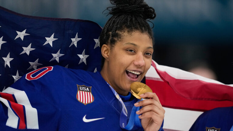 United States' Laila Edwards (10) poses after the United States' women's ice hockey team was presented with the gold medals at the 2026 Winter Olympics, in Milan, Italy, Feb. 19, 2026. (Petr David Josek/AP)