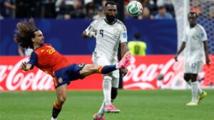 Spain's Marc Cucurella, left, and Saudi Arabia's Feras Albrikan vie for the ball during the World Cup Group H soccer match between Spain and Saudi Arabia in Atlanta, Sunday, June 21, 2026. (AP Photo/Erik S.Lesser)