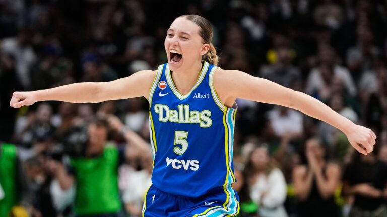Dallas Wings guard Paige Bueckers reacts to a win over the Seattle Storm in overtime in a WNBA basketball game, Monday, June 22, 2026, in Seattle. (AP Photo/Lindsey Wasson)