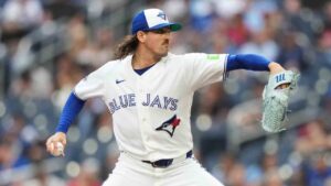 Toronto Blue Jays pitcher Kevin Gausman (34) works against the Texas Rangers during first inning MLB baseball action in Toronto, on Thursday, June 25, 2026. (Nathan Denette/CP)