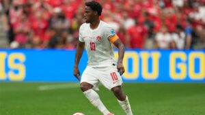 Canada's Jonathan David (10) controls the ball during the World Cup Group B soccer match between Switzerland and Canada in Vancouver, British Columbia, Wednesday, June 24, 2026. (AP Photo/Abbie Parr)