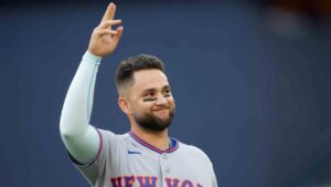 New York Mets third baseman Bo Bichette (19) acknowledges the crowd as he's presented with a tribute video from his time as a Toronto Blue Jay prior to first inning American League MLB baseball action between the Toronto Blue Jays and the New York Mets, in Toronto, Monday, June 29, 2026. (Nathan Denette/CP)