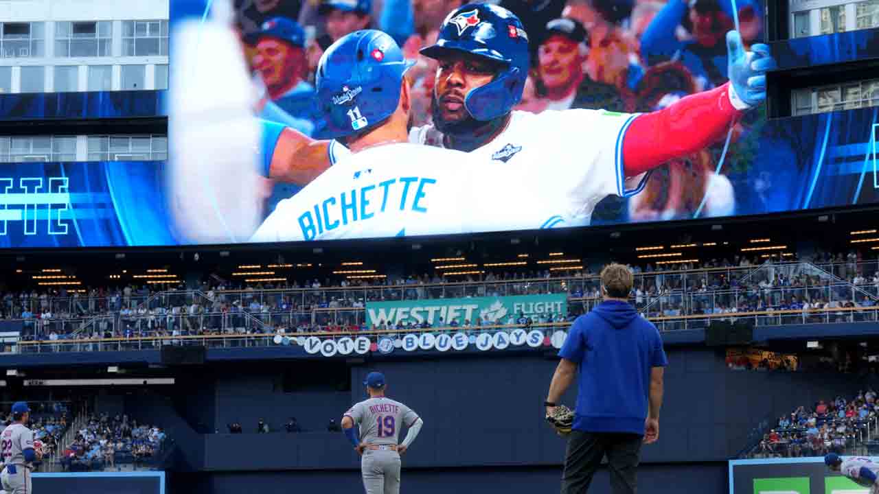 New York Mets third baseman Bo Bichette (19) looks on at a tribute video from his time as a Toronto Blue Jay prior to first inning American League MLB baseball action between the Toronto Blue Jays and the New York Mets, in Toronto, Monday, June 29, 2026. (Nathan Denette/CP)