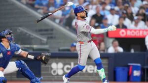 New York Mets third baseman Bo Bichette (19) watches his ball as he flies out during first inning American League MLB baseball action against the Toronto Blue Jays, in Toronto, Monday, June 29, 2026. (Nathan Denette/CP)