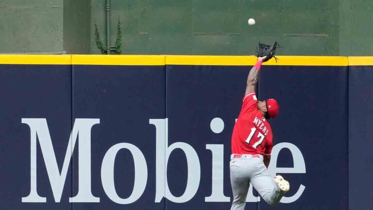 Cincinnati Reds' Dane Myers makes a leaping catch during the fourth inning of a baseball game against the Milwaukee Brewers, Monday, June 29, 2026, in Milwaukee. (Aaron Gash/AP)