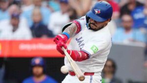 Toronto Blue Jays' Yohendrick Pinango (24) hits a single against the New York Mets during second inning MLB baseball action in Toronto on Tuesday, June 30, 2026. (Nathan Denette/CP)