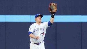 Toronto Blue Jays outfielder Daulton Varsho (5) makes a catch against the New York Mets during third inning MLB baseball action in Toronto on Tuesday, June 30, 2026. (Nathan Denette/CP)