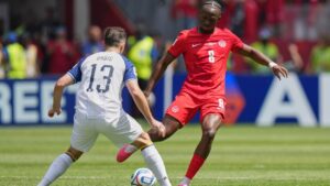 Bosnia's Ivan Basic, left challenges Canada's Ismael Kone for the ball during the World Cup Group B soccer match between Canada and Bosnia in Toronto, Friday, June 12, 2026. (Stephanie Scarbrough/AP)