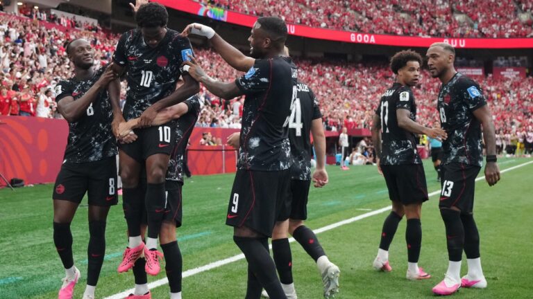 Canada's Jonathan David (10) celebrates his goal against Qatar with teammates during the first half of a World Cup Group B soccer match, in Vancouver, on Thursday, June 18, 2026. (Darryl Dyck/AP)