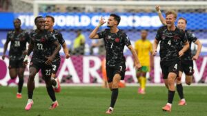 Canada's Stephen Eustaquio (7) celebrates scoring their opening goal against South Africa during the World Cup round of 32 soccer match in Inglewood, Calif., near Los Angeles, Sunday, June 28, 2026. (AP Photo/Andre Penner)