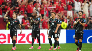 Canada players celebrate their team's win in the World Cup Group B soccer match against Qatar in Vancouver, British Columbia, Thursday, June 18, 2026. (Abbie Parr/AP)