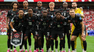 Canada's starting lineup post for a photo ahead of their match against against Qatar in Vancouver. (Abbie Parr/AP)