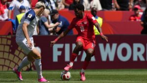 Bosnia's Tarik Muharemovic, left ,challenges Canada's Jonathan David during the World Cup Group B soccer match between Canada and Bosnia in Toronto, Friday, June 12, 2026. (Stephanie Scarbrough/AP)