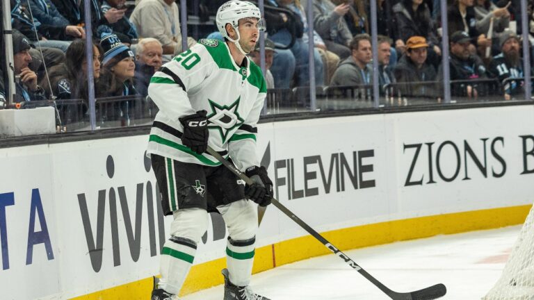 Dallas Stars defenceman Kyle Capobianco (20) looks to move the puck against the Utah Mammoth during the first period of an NHL hockey game Thursday, Jan. 15, 2026, in Salt Lake City. (AP Photo/Melissa Majchrzak)