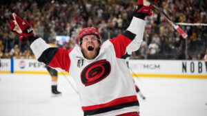 Carolina Hurricanes left wing Nikolaj Ehlers (27) celebrates after scoring an empty-net goal during the third period in Game 6 of the NHL hockey Stanley Cup Final series against the Vegas Golden Knights, Sunday, June 14, 2026, in Las Vegas. (John Locher/AP)