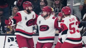 Carolina Hurricanes left wing Taylor Hall, center, celebrates his goal with teammates during the first period in Game 6 of the NHL hockey Stanley Cup Final series against the Vegas Golden Knights, Sunday, June 14, 2026, in Las Vegas. (John Locher/AP)
