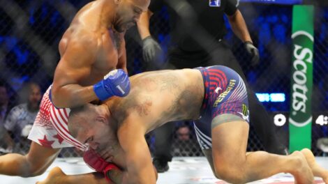 Alex-Pereira,-bottom,-fights-Ciryl-Gane-during-their-interim-heavyweight-title-bout-at-UFC-Freedom-250-on-the-South-Lawn-of-the-White-House