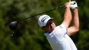 Corey Conners, of Canada, watches his tee shot on the sixth hole during the final round of the U.S. Open golf tournament at Shinnecock Hills Golf Club in Southampton, N.Y., Sunday, June 21, 2026. (AP Photo/David J. Phillip)