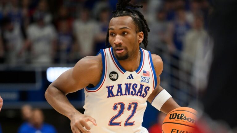Kansas guard Darryn Peterson moves the ball against Utah during the first half of an NCAA college basketball game in Lawrence, Kan., Saturday, Feb. 7, 2026. (Reed Hoffmann/AP)
