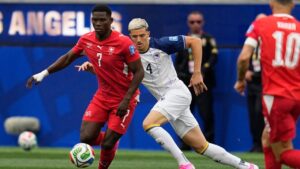 Switzerland's Breel Embolo (7) challenges for the ball with Bosnia's Tarik Muharemovic (4) during the World Cup Group B soccer match between Switzerland and Bosnia in Inglewood, Calif, near Los Angeles, Thursday, June 18, 2026. (Gregory Bull/AP)