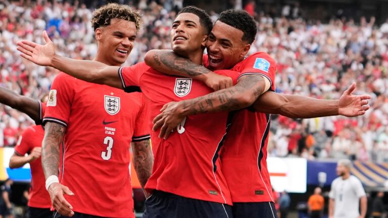 England's Jude Bellingham (10) celebrates with teammates after scoring their first goal during the World Cup Group L soccer match between Panama and England in East Rutherford, N.J., near New York, Saturday, June 27, 2026. (AP Photo/Steve Luciano)