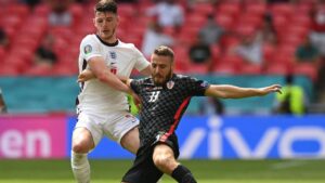 Croatia's Nikola Vlasic, right, fights for the ball with England's Declan Rice during the Euro 2020 soccer championship group D match between England and Croatia at Wembley stadium in London, Sunday, June 13, 2021. (Glyn Kirk/Pool Photo via AP)