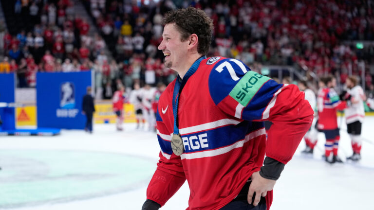 Norway's Eskild Bakke Olsen celebrates after winning the bronze medal ice hockey match between Canada and Norway at the 2026 IIHF Men's Ice Hockey World Championship in Zurich, Switzerland, Sunday, May 31, 2026. (Darko Bandic/AP)
